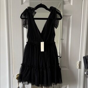 Chic Black Mini Dress with Tulle Accents